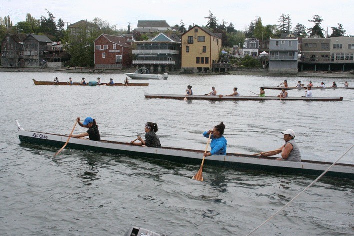 Tribal members from the Puget Sound area and Canada race their canoes in this year’s Penn Cove Water Festival in May. The future of the festival is in doubt unless new volunteers step forward to keep the popular Coupeville tradition alive.