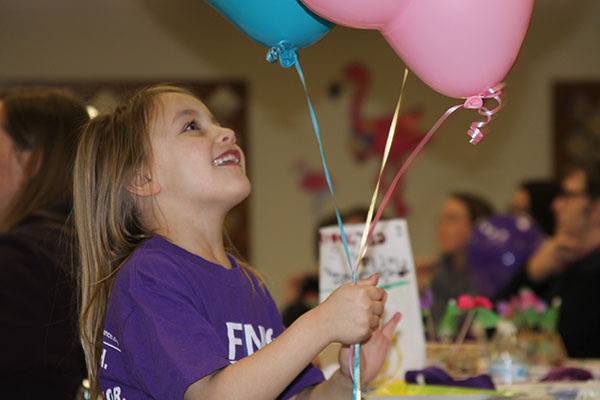 Elayna Charboneau plays with balloons during a 2015 Relay for Life of Whidbey Island kickoff event held earlier this year at the Oak Harbor Elks Lodge. Charboneau