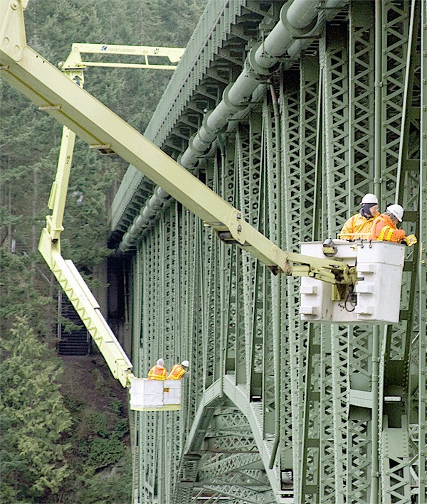 State Department of Transportation bridge inspectors examine the span over Deception Pass in 2009. The span over Canoe Pass was examined the same year. Per the Federal Highway Administration’s standards