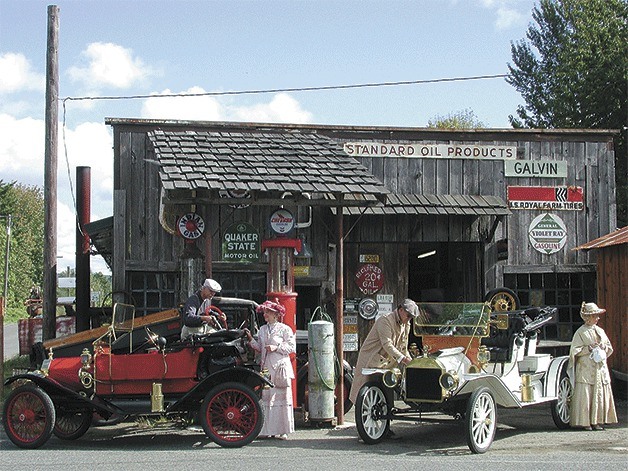 Vehicles with the Skagit-Snohomish chapter of the Horseless Carriage Club of America make a pitstop in Chehalis during a past tour. The club will be sending 67 pre-1916 vehicles from Cadillacs to Hudsons during the Island Navigator Tour on Whidbey Island Sept. 7-11.