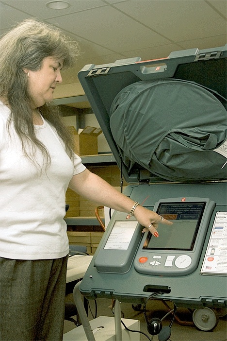 Michelle Reagan performs a ballot accuracy testWednesday.