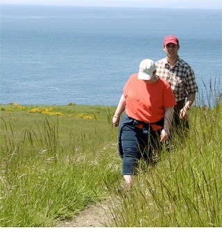 Langley residents Stacie and Chris Johnson walk the trails at Fort Ebey State Park. The National Park Service recently conducted a survey to gauge visitors’ opinions of Ebey’s Landing National Historical Reserve.