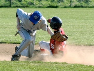 Coupeville’s J.D. Wilcox slides safely into second with a stolen base in the bottom of the fifth inning.