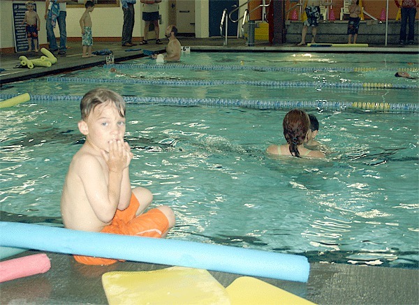 Five-year-old Rhett Molina takes a break from swim lessons at the John Vanderzicht Memorial Pool. North Whidbey Park and Recreation District recently canceled the popular dog swim  this year because of maintenance changes.