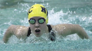 Emily Huffer swam to a runner-up finish and new Pacific Northwest Swimming Championships qualifying time of 31.75 in the girls 11 and 12-year-old 50-yard butterfly.