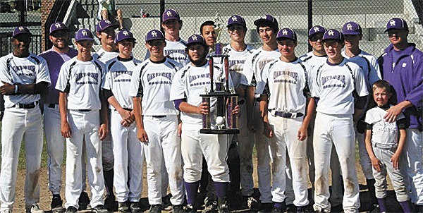 Oak Harbor's shows off its title trophy from the Anacortes tournament.