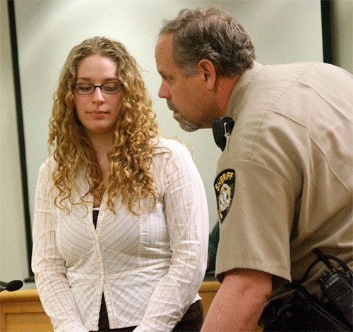 A corrections deputy directs 21-year-old Jordyn Weichert in Island County Superior Court Wednesday. Weichert is on trial for her role in an accident that killed three people on North Whidbey last September.