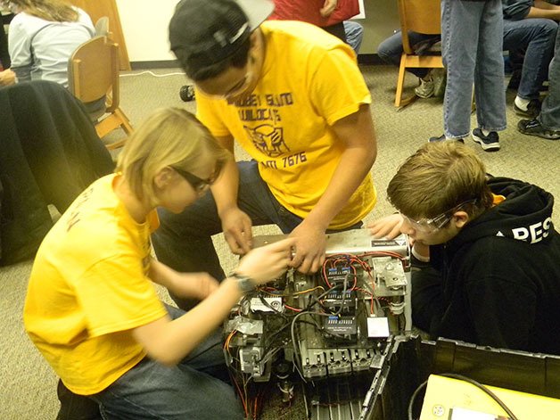 Oak Harbor High School Robotic Team students work on a robotics project in Che Edoga’s class. The team will present to the public their designs 6-8 p.m. Jan. 9 at  the high school.