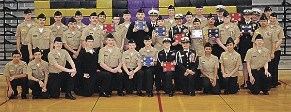 The Oak Harbor High School NJROTC unit shows off its awards after a regular-season competition.