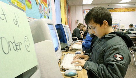 Coupeville Elementary School fourth-grader Ethan Turner types on a computer in Brandi Hewell’s classroom