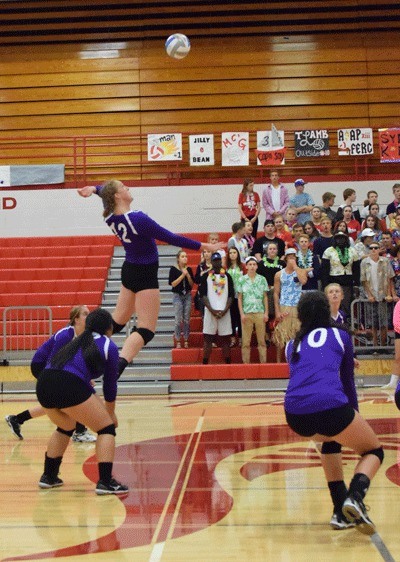 Hailee Blau goes for the kill in Oak Harbor's match at Stanwood Tuesday.