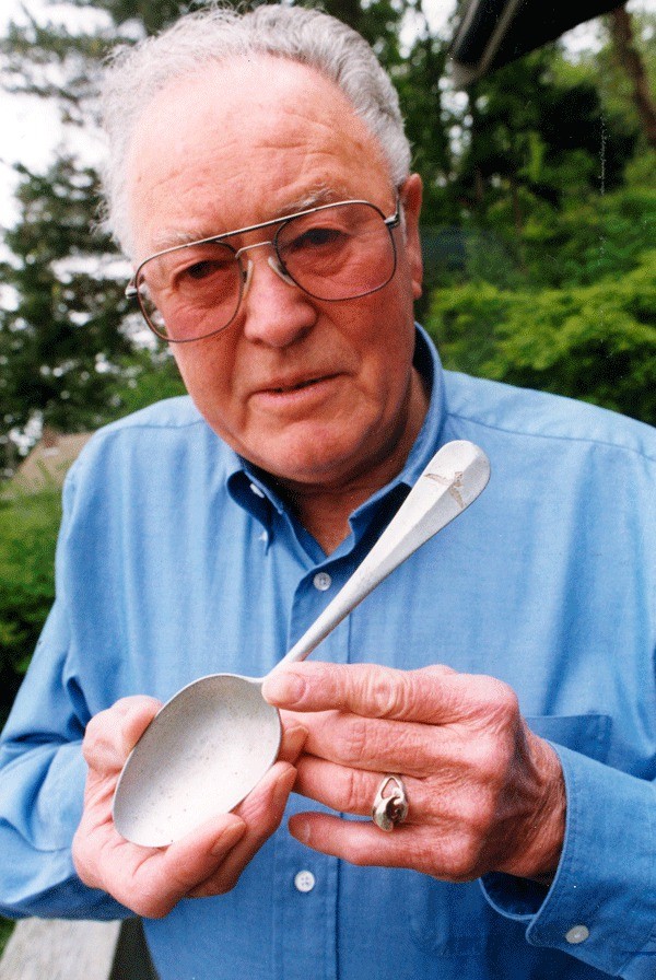 Coupeville resident Bill Ethridge holds up the only utensil he was issued to use while being held prisoner at camps throughout Germany during World War II. He recalls some men attempting to sharpen their spoons in order to create weapons.