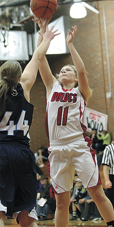 Bree Messner lofts a shot over Sultan's Shelby Jeffries.