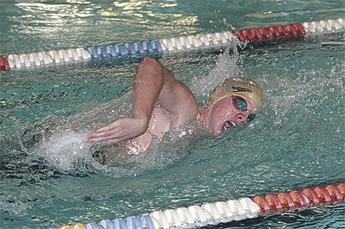 Oak Harbor's Joe Gorman swims to third place in the 400 freestyle Wednesday. He also placed third in the 200 free and anchored the winning 200 medley relay team.
