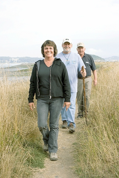 Tom and Betsy Murphy and Leif Haslund continue their hike through Ala Spit.