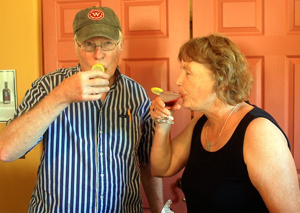 Whidbey Island Distillery owners Bev and Steve Heising toast their success with drinks they couldn’t have offered customers before Senate Bill 5353. Steve drinks the distillery’s rye whiskey