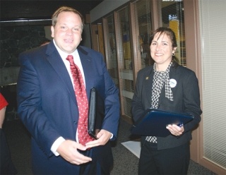 Island County Commissioner Phil Bakke chats with his opponent