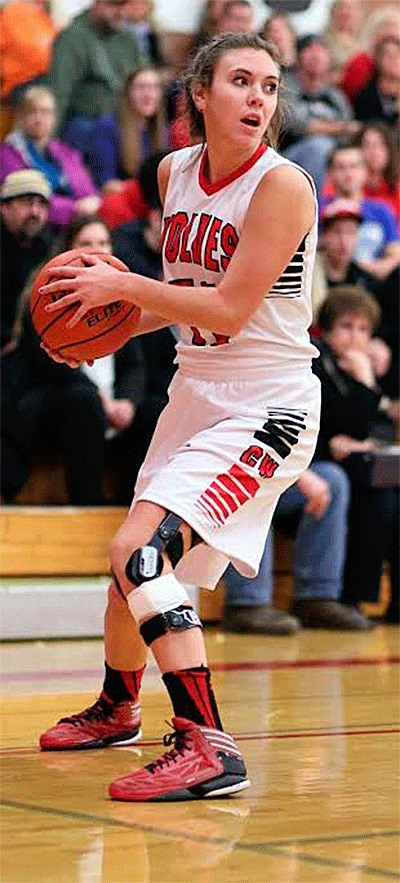Coupeville's Julia Myers looks to pass for the Wolves in Monday's win.