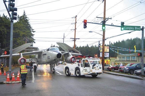 An A-3 Skywarrior is moved early this morning to its new home outside Langley Gate at Whidbey Island Naval Air Station.