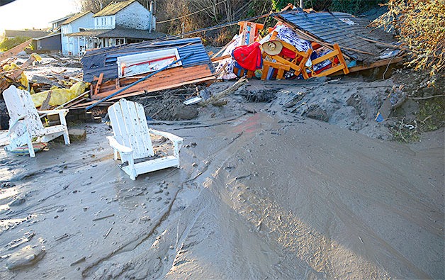 The remains of a cabin destroyed in a mudslide on South Whidbey include two Adirondack chairs and other possessions belonging to the shaken owners.