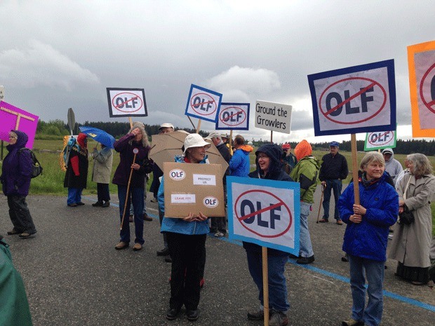 Members of Citizens of Ebey's Reserve and other residents protest Navy jet noise at OLF Coupeville a couple of years ago. COER's lawsuit against the Navy was dismissed this week.