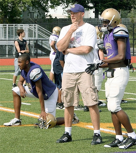Oak Harbor head coach Jay Turner keeps his eyes on the action during spring drills.