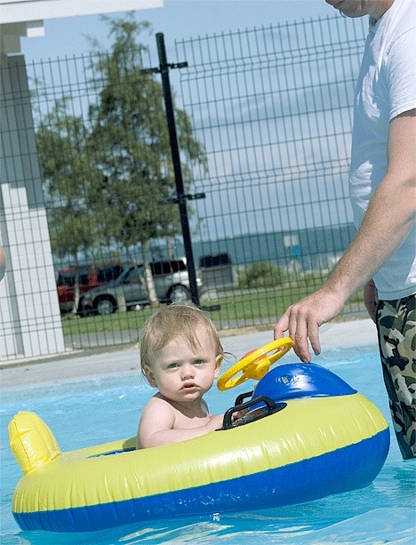 Fourteen-month-old Michael Lloyd of Mount Vernon takes a dip in the Windjammer Park kiddie pool Thursday afternoon. The weekend forecast calls for temperatures in the mid-80s.