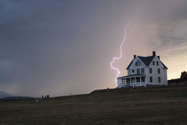 A lightning strike lands near the Colonel's House at the Camp Casey Conference Center in Coupeville Thursday night