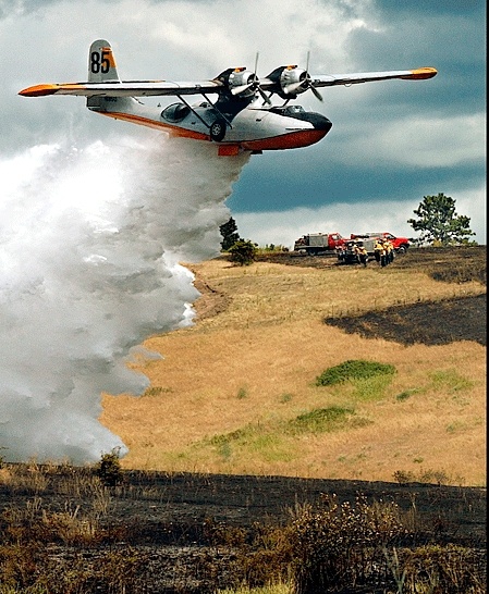 A PBY turned water bomber drops 1