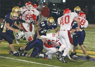 Oak Harbor’s hard hitting defense led by Alec Castillo