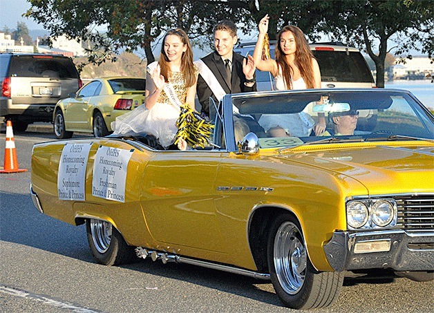 Oak Harbor freshman royalty ride in style during the 2013 Homecoming Week parade in downtown. This year’s parade is Wednesday
