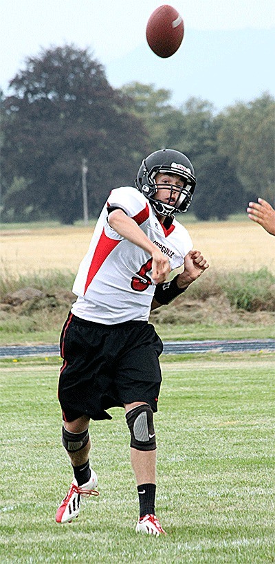 Joel Walstad tosses a pass for Coupeville at the La Conner jamboree Friday.