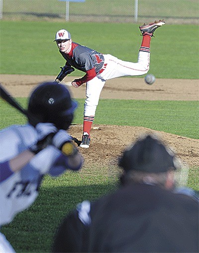 Coupeville's Wade Schaef tosses a pitch at South Whidbey Friday.
