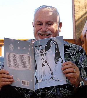 Author Theodore J. Duris gets a chuckle out of his children’s book