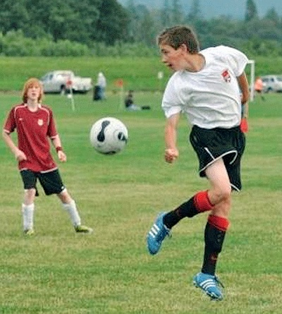 Caley Powers volleys the ball in the championship game.