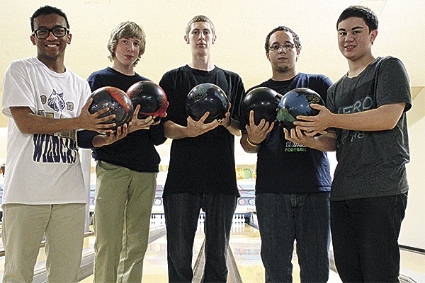 Oak Harbor's varsity No.1 team will seek its fourth consecutive state bowling title this weekend. From left