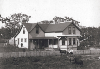 L.P. Byrne drives a buggy with wife Katy Nonan and daughter Pauline in front of their 1800s mansion. The home remains standing on Midway Boulevard.