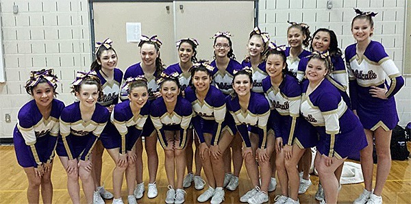 The Wildcat cheer team is all smiles after a solid routine at Gig Harbor High School Saturday.