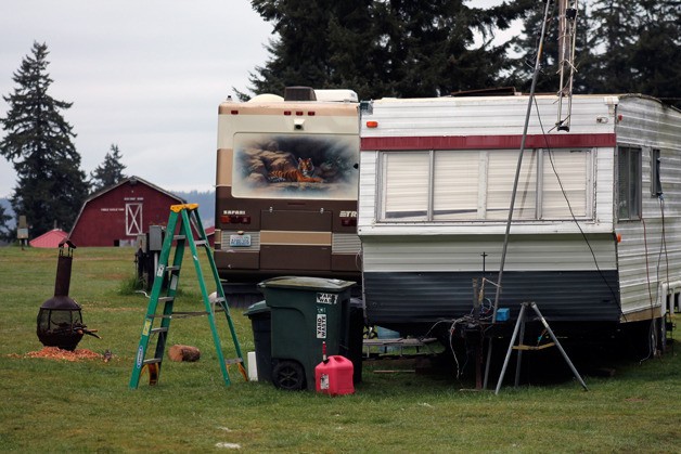 A pair of camping trailers occupy spots at the RV lot south of the Island County Fairgrounds in Langley. Under a redesign and renovate proposal