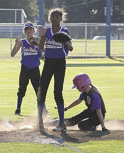North Whidbey's Loralai Snyder steals second in Monday's win.