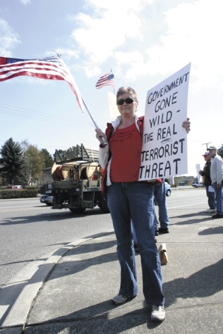Oak Harbor resident Pam Tomlinson participates in a tea party