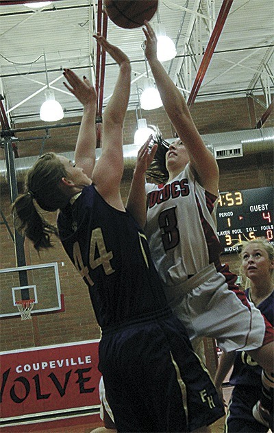 Amada Fabrizi (3) powers over the defense of Friday Harbor's Tabatha Keane (44).