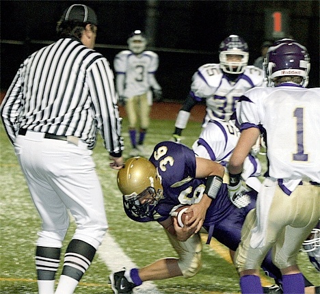 Brent Rryan bulls in for Oak Harbor’s final score in Friday’s homecoming win.