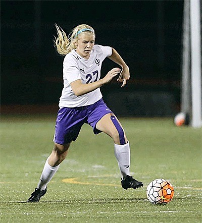 Lydia Peplinski hustles to the ball in the Wildcats' win over Lynnwood. Peplinski broke a 0-0 tie with a late goal.