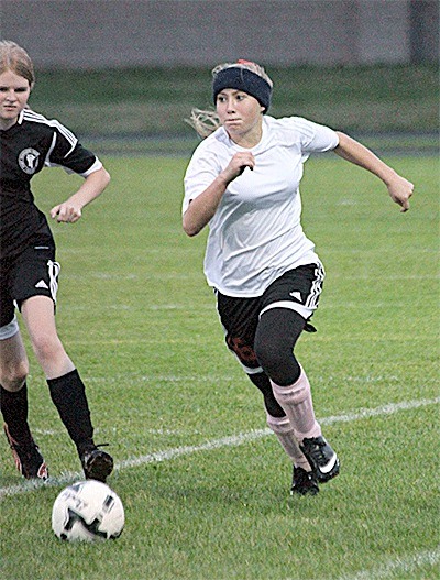 Coupeville's McKenzie Meyer hustles to the ball Thursday.