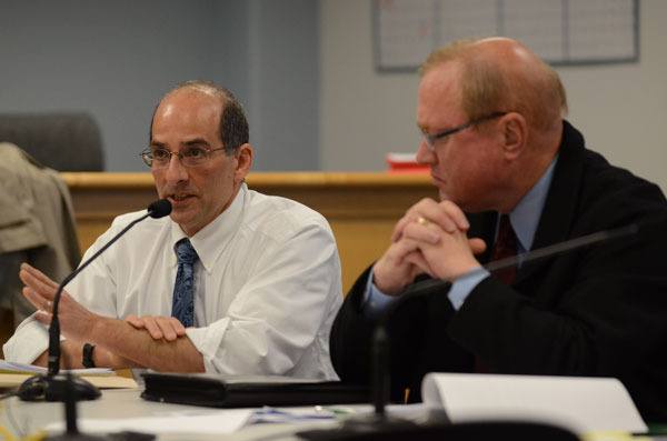 Island County Prosecutor Greg Banks addresses the commissioners last week about the shortcomings in the justice system that have resulted from budget reductions. He and Island County Sheriff Mark Brown