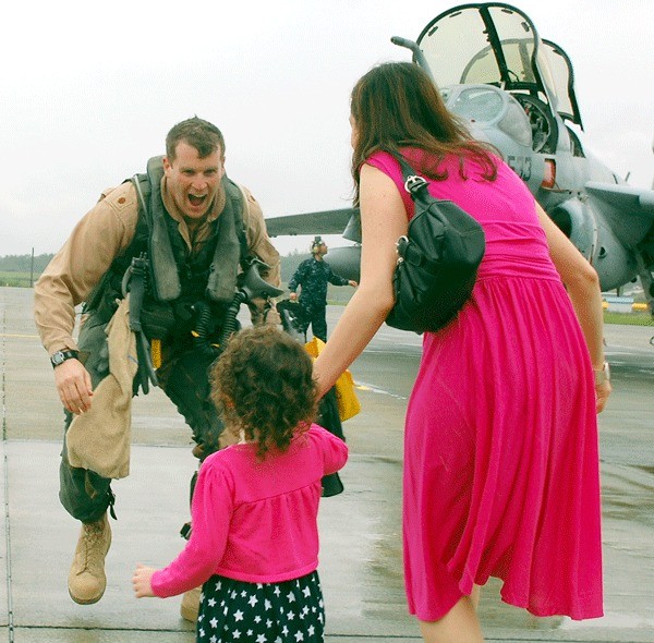 VAQ 133 Lt. Cmdr. Ariel Klein greets his 3-year-old daughter Katherine