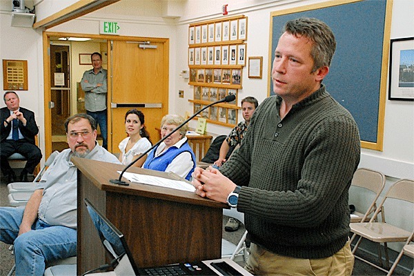 Port of South Whidbey Commissioner Geoff Tapert addresses the Oak Harbor City Council last week on a plan that could land an expansion of Freeland's Nichols Brothers Boat Builders on the Seaplane Base.