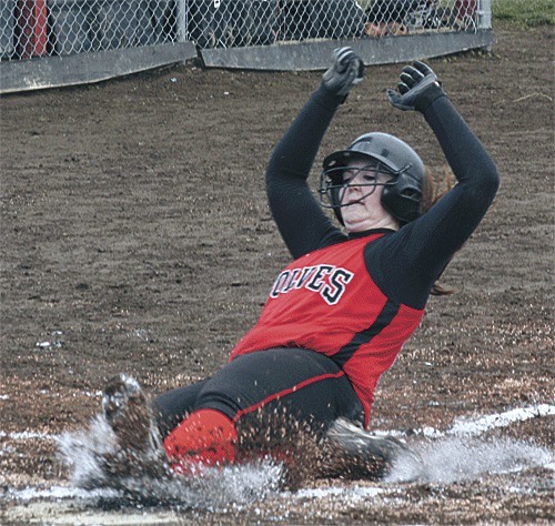 Hailey Hammer scores one of Coupeville's 22 runs against Concrete.