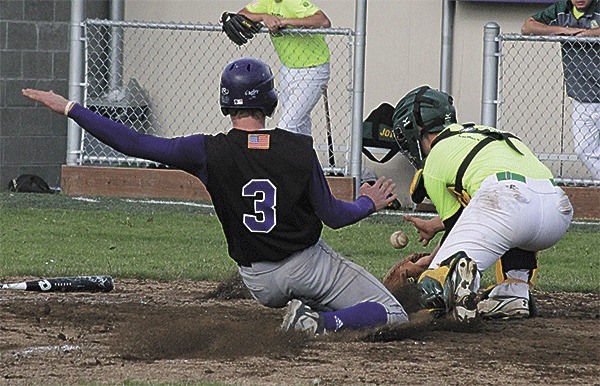 Koby Cosper scores the winning run off a single by Clay Doughty in the ninth inning Wednesday.